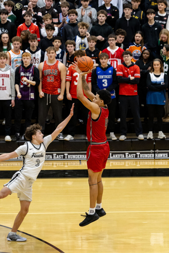 Kam Mercer shoots a jump shot in his Princeton High School Debut